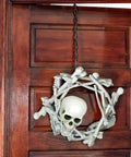 Life Size Skeleton Bone Set For Halloween Decor In A Mesh Bag 28 Piece Spooky Graveyard Skeletons wreath on wooden door