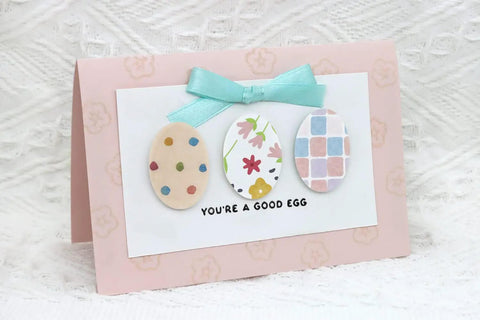 Handcrafted Easter card featuring three oval paper cutouts made with 2 Inch Oval Easter Egg Punch Lever Action Craft Punch.