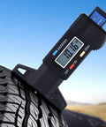 Tool for Measuring Tread tire Pattern Depth Gauge Electronic Digital Represents 0-25mm Depth Vernier Caliper on tire tread.