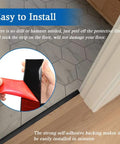 Self Adhesive Floor Transition Strip For Laminate And Vinyl 2 Inch Wide 10 Feet Long Black PVC Edge Strip shown in use