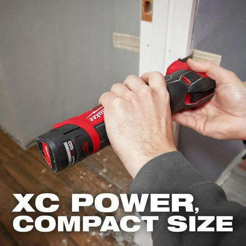 Person using M12 RedLithium High Output 2.5Ah Battery With RedLink Intelligence Delivers Beefy XC Power In A Compact Size tool