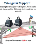 Top Shelf Folding Work Platform And Scaffold Tower With Adjustable Height showing triangular support and weights on steel frame.