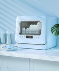 Pretty Slick Countertop Dishwasher Fully Automatic Stainless Steel With Six Place Settings LED Display And Delay Start Quick Connect Faucet Adapter Smooth Hassle Free Setup on kitchen counter.