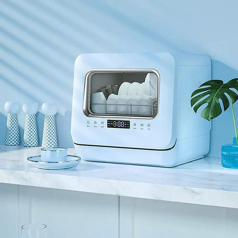 Pretty Slick Countertop Dishwasher Fully Automatic Stainless Steel With Six Place Settings LED Display And Delay Start Quick Connect Faucet Adapter Smooth Hassle Free Setup on kitchen counter.