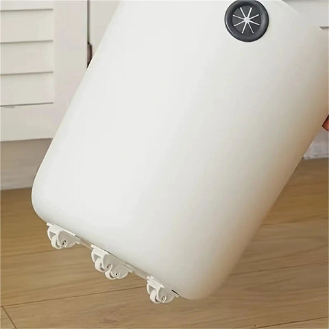 Bottom view of trash can with eight 360 degree self adhesive ABS caster wheels for small appliances trash cans organizers and craft projects