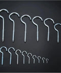 Knockout Vinyl Coated Screw Hooks and Heavy Duty Eye Bolts, 20 piece vinyl coated set for easy wall mounting on wood or drywall surfaces.