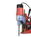 Kickass Portable Magnetic Drill Press Tough As Nails Industrial Grade Workhorse For Heavy Duty Steel And Metal Fabrication With Ac Power Smooth Vertical Action On Job Sites, showing drill with motor and controls.