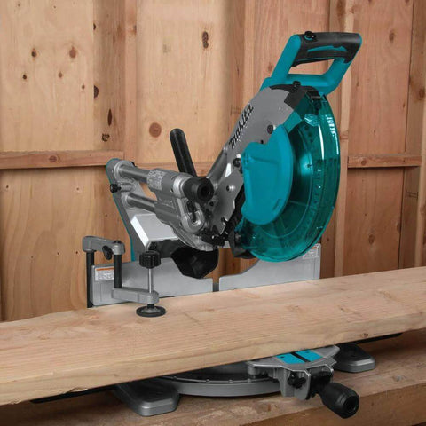 Makita 10-in dual-bevel sliding compound miter saw with laser, side view, teal blade guard.