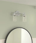 Four Light Vanity Lighting Fixture With Chrome Finish And Clear Glass Shades For Totally Modern Bathroom Vanity Over Mirror