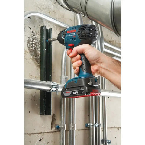 Person using Compact 18V One Quarter Inch Hex Impact Driver Bare Tool With Built In LED Light for tight spaces