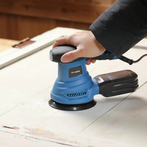 Beefy 4.9 Inch Random Orbital Sander Corded Power Tool With Full 20 Piece Sandpaper Roll Kit in use on a wood surface.