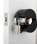 Built Tough Door Knob Lockout Cover Keeps Spaces Locked Down With Zero Drama Blocks knob turning with padlock on door.