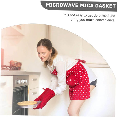 Woman using microwave with 10 Pack Mica Sheets For Microwave Oven Heat Resistant Waveguide Insulation Plates