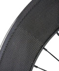Close-up of Carbon Fixed Gear Wheelset 700c Clincher 88mm Rear Hella Lightweight And Strong Speed Boosting Wheelset rim and spokes.