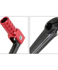 Close-up of CNC Aluminum Folding Gear Shift Lever for 50cc to 160cc Pit Bikes, Adjustable Angle, showing red tip and joint.