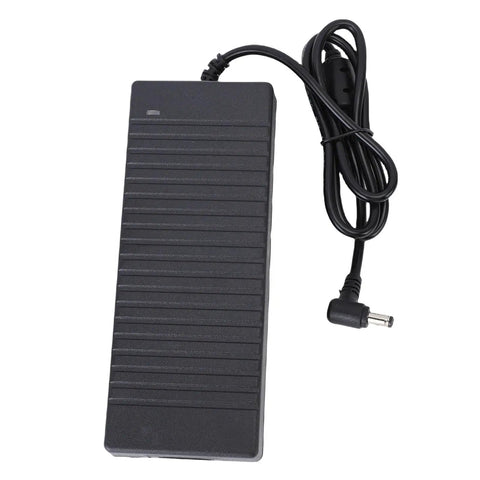 Compact Counter Ice Maker Cranks Out Eight Chill Cubes Quick And Slick Lil Build Nestles Easy On Kitchens Or Car Dashboards With Smooth Dual Voltage Hookups For Roommates And Road Trips power adapter with black casing and cord.