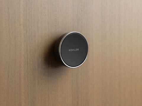 Anthem Digital On Off Remote Control For Shower System Sleek Wireless Button on a wooden wall, front view
