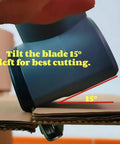 Tyimble Cordless Electric Scissors Heavy Duty Cardboard Cutter demonstrating blade tilt angle for optimal cutting.