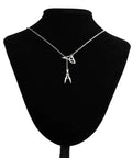 Engineer Graduation Gift Bracelet For Engineers And Architects With Engraved Quote Pendant And Protractor Charm showcased on black stand.