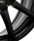 Close-up of Enkei EDR9 17x7 matte black wheel with 4x100/108 bolt pattern.