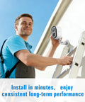 Person installing Wireless Outdoor Security Cam System With 2K HD Color Night Vision on house wall using ladder