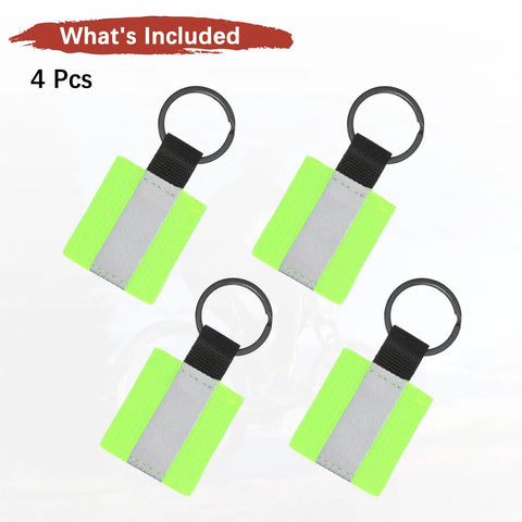 Four Pack Fluorescent Green Reflective Safety Pendants For Night Running, Cycling, Walking, Hiking, And Backpack Gear And Double Sided Fabric Reflective Keychain Tags showing four pendants with keyrings