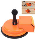 Heavy Duty Floor Gap Fixer And Puller Tool With 180 Lb Suction, Ergonomic Handle, shown in orange with installation example