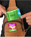 Person using 16 Piece RFID Blocking Sleeve Set with 12 Colorful Credit Card Protectors and 4 Passport Holders in a backpack pocket.