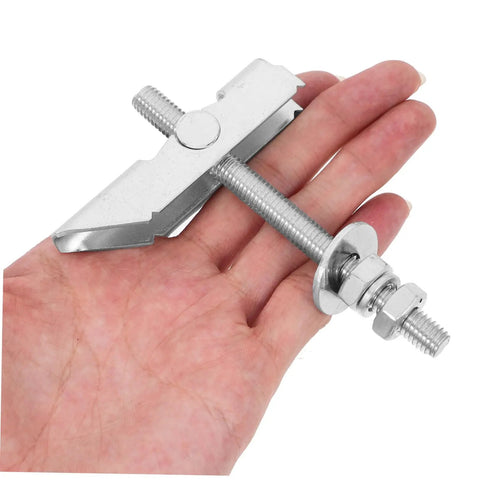 Hand holding Beefy Heavy Duty Metal Toggle Bolt and Drywall Anchor Kit M8x72x100mm, showing wing nut fastening for wall mounting.