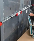 Top Shelf K Body Revo Clamp Kit Including Two 24 And Two 50 Inch F Clamps With Quick Slide Wideners in use on cabinetry.