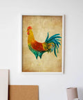Framed rooster painting on beige background hung on a white wall above crafting supplies.