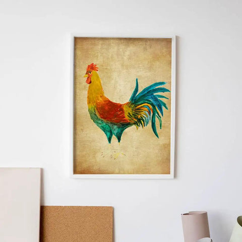Framed rooster painting on beige background hung on a white wall above crafting supplies.