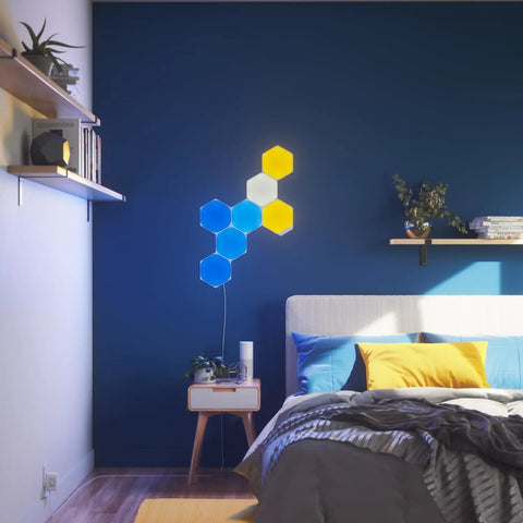 Hexagon Shapes Expansion Pack for Smarter Kit on bedroom wall with colorful modular RGB LED panels in dynamic layout