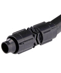 Raindrip S5600UB universal irrigation coupling, black plastic fitting for 1/2, 5/8, and 0.710 inch tubing (front view)