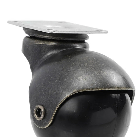 Top Shelf 2 Inch Antique Brass Swivel Casters With Heavy Duty Ball Bearings 4 Piece Furniture Wheel set, close-up of caster.