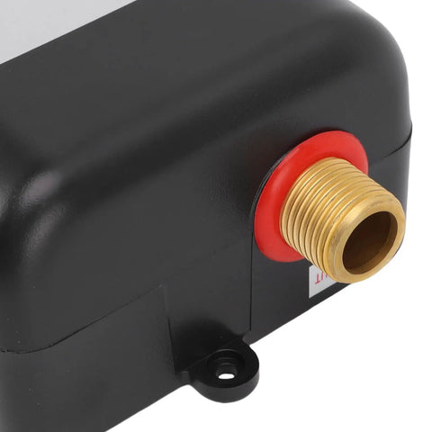 Close-up of brass port on Compact Electric Under Sink Water Heater for tankless hot water delivery.