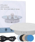 JAYEGT Motorized Rotating Display Stand with USB charging for jewelry, 7.87 Inch electric turntable, showcases items with colored backdrops.