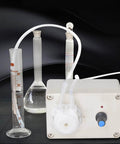 Peristaltic Liquid Dosing Pump For Lab And Aquarium Use 110 To 240 Volts, with tubing connected to laboratory glassware