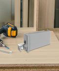 Beefy Heavy Duty Hidden Cabinet Hinges Set With Soft Close shown with tools on wooden surface, gray and compact design