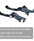 Ultra Bee Ready To Roll Brake And Clutch Lever Set CNC Foldable Aluminum 7075 Upgrade Kit for Sur Ron Ultrabee displayed