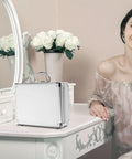 Tough As Nails Aluminum Tool Chest With Comfortable Grip Handle And Solid Metal Latch Portable Hard Storage Case on a vanity.