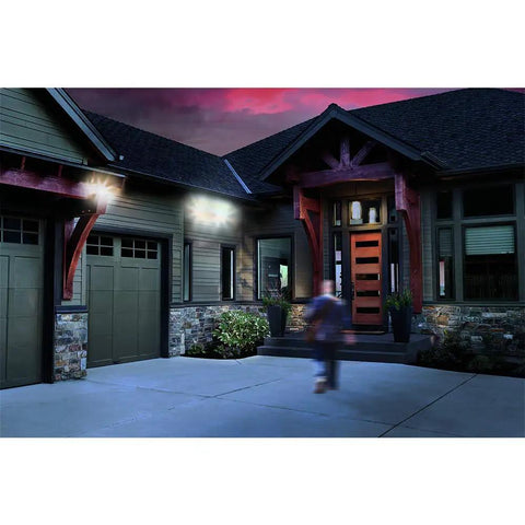 House exterior with Bronze 180 Degree Motion Sensing Floodlight Sensor Replacement For Outdoor Security Lights Detects Up To 70 Feet