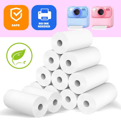 12 Roll Kids Instant Camera Print Paper Refill BPA Free 56mm By 24mm Thermal Paper For Photo Printers, Each Roll Prints About 60 Pics, Safe Premium Paper. 12 rolls of white thermal paper and kids camera icons