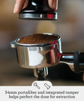 Premium Home Barista Espresso Machine With Manual Microfoam Milk Texturing 1650 Watt Rapid Steam Wand Volumetric Shot Control Black Sesame Finish, using 54mm portafilter and tamper for espresso extraction.