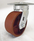 Built Like A Tank Set Of Four Five X Two Inch Swivel Casters Kingpinless Ductile Steel Frame wheel close-up with metal bracket.