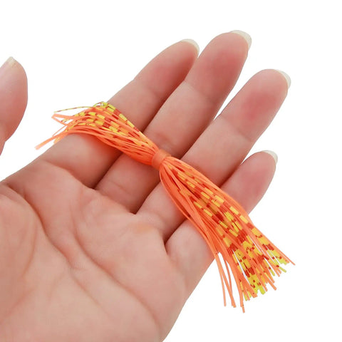 Top Shelf Flexible Silicone Lure Skirts Six Hundred Strand Bulk Pack For Jig Tying And Spinnerbait Assembly shown in hand.