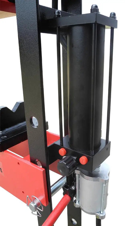 Close-up of the cylinder and mechanism on the 20 Ton Air Powered Hydraulic Shop Press featuring precision gauge and controls.