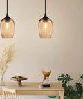 Modern dining room with Dope Two Pack One Light Pendant Lights For Kitchen Island In Indoor Dining With Hand Blown Seeded Amber Glass