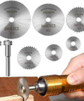 Eight Piece Rotary Drill Saw Blades Set With One Eighth Inch Shank for Most Rotary Tools HSS Steel Disc Cutters in use on wood