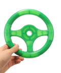 Hand holding green Kids Steering Wheel Toy For Outdoor Playsets And Swings, Portable Plastic Accessory For Pretend Play, 6.3 inches